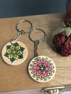 The two Flower designs, one shimmer green (and yellow), and the other pink with colour-shifting rose-green shimmer.