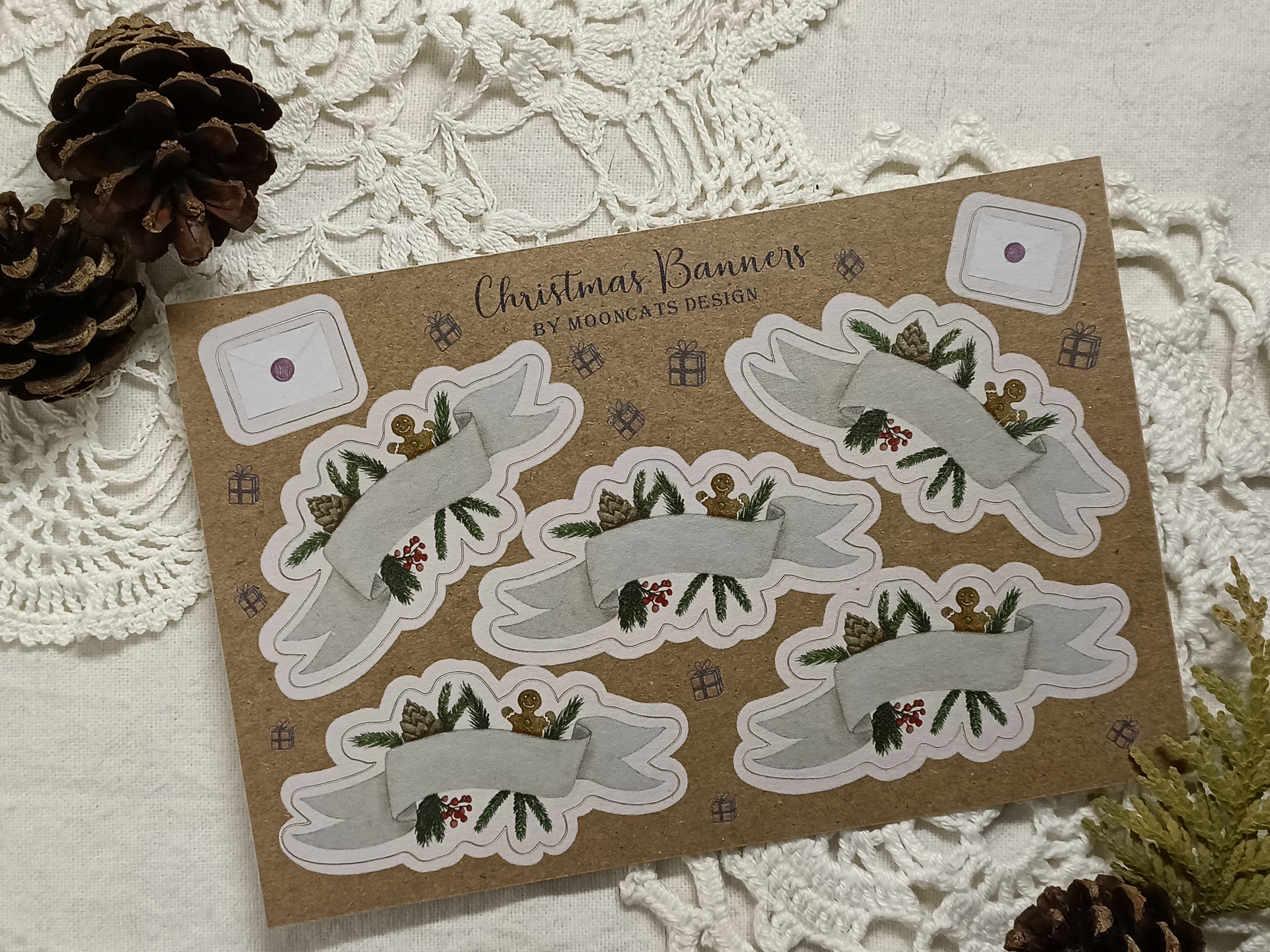 Set of Christmas-themed banner stickers made of kraft paper with decorative elements.