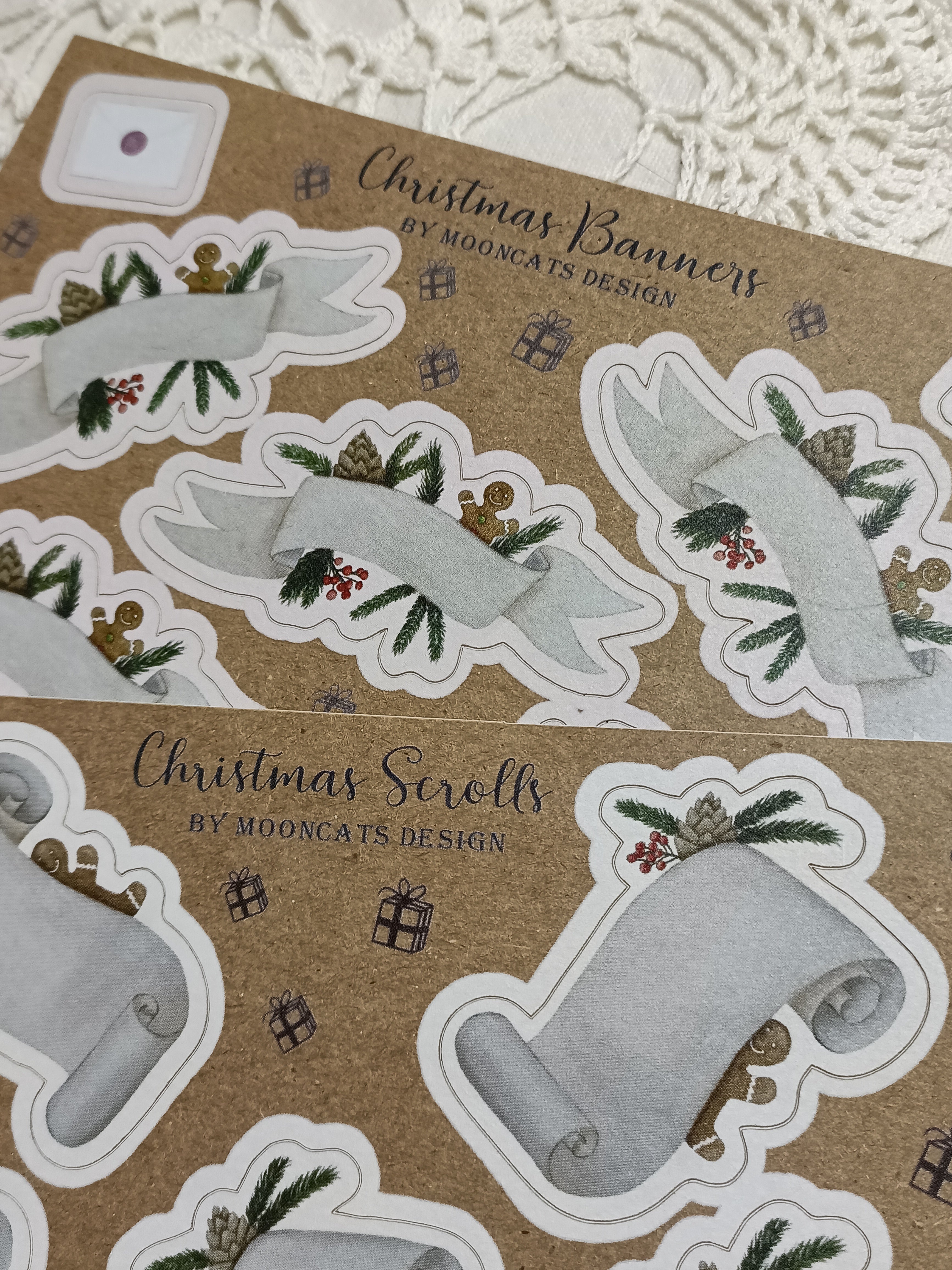 Close-up of the Christmas Banners and Christmas Scrolls kraft paper label sticker sheets.