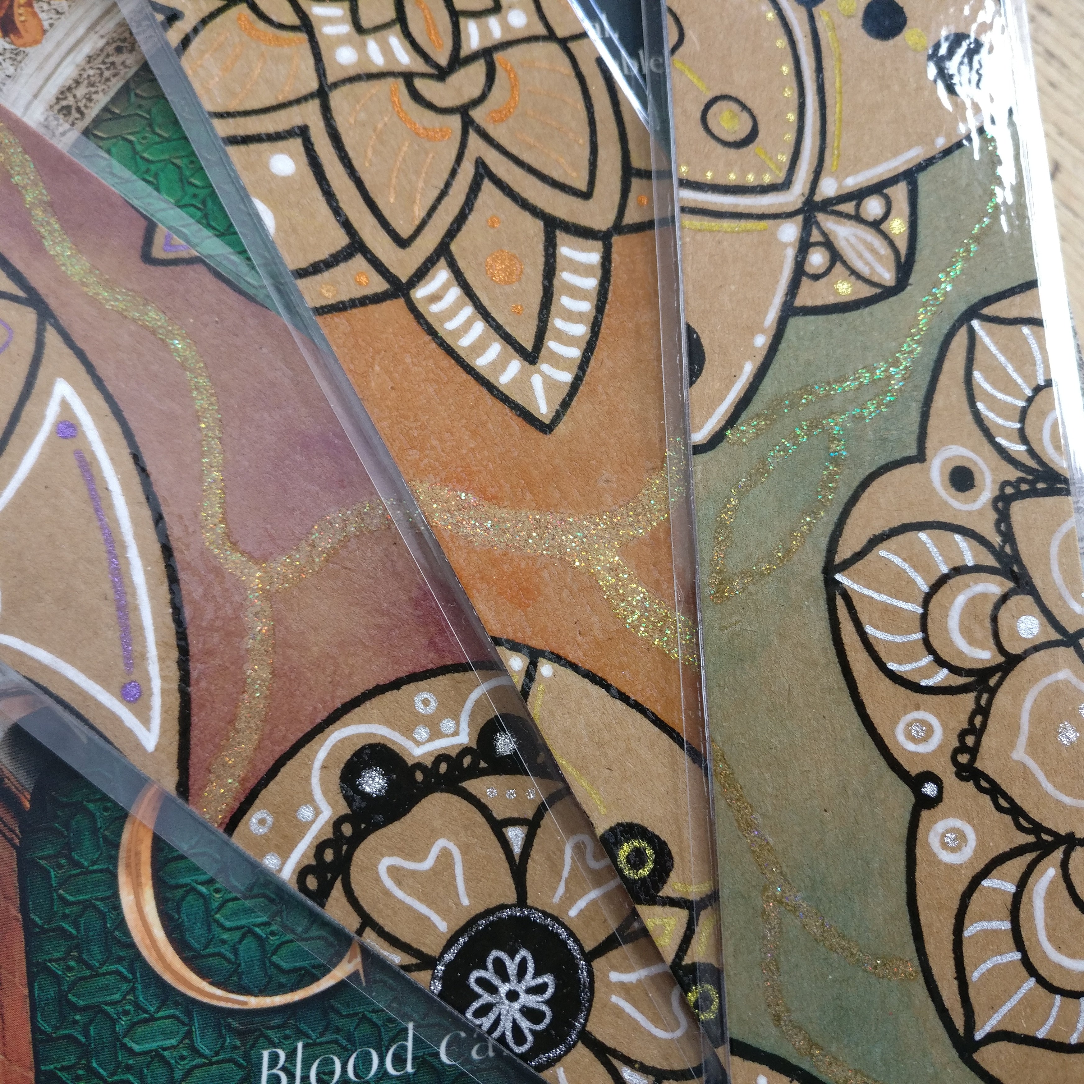 Close-up of the three colour options of the Mandala Bookmark.