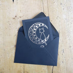 Black Mandala Moon Cat card with silver foil.