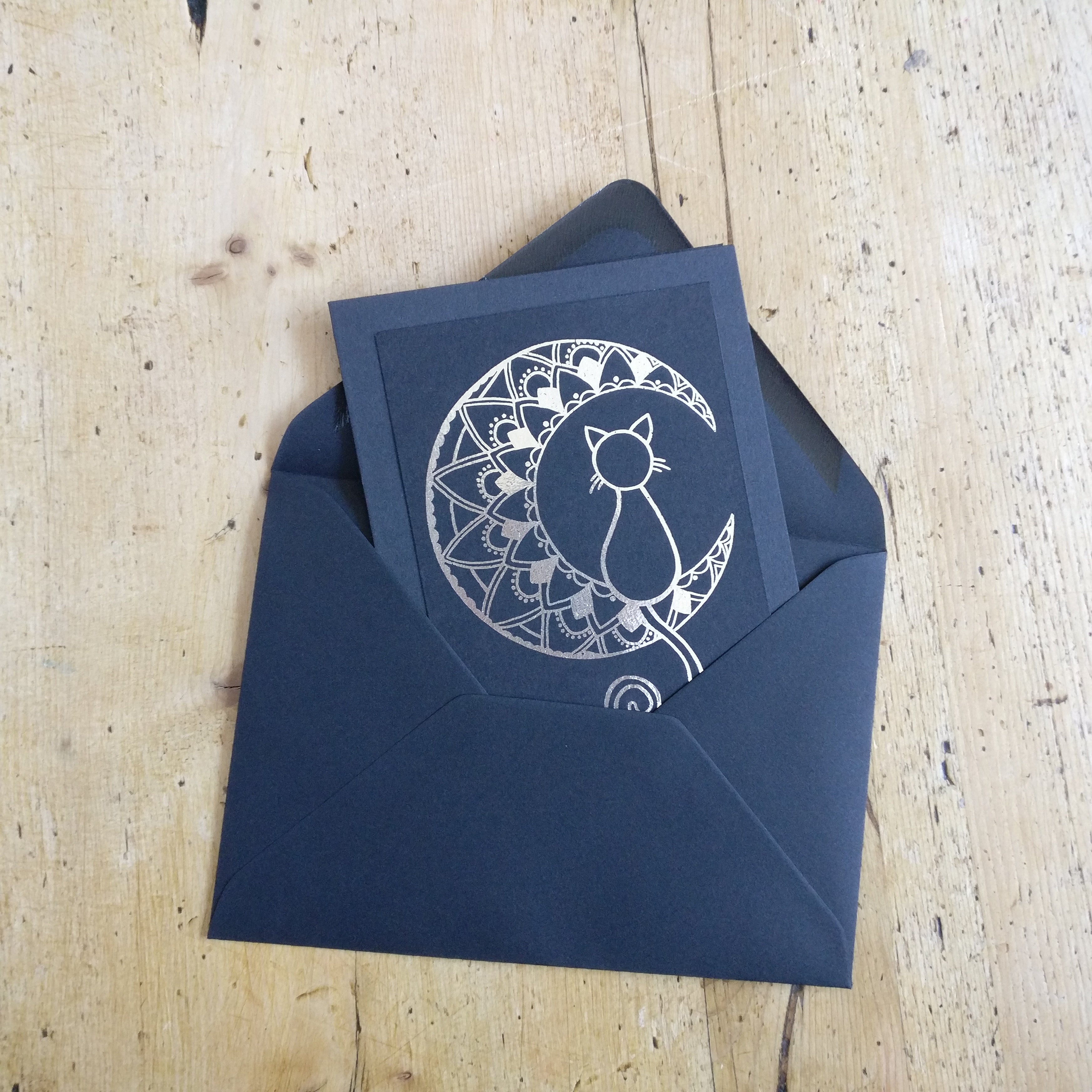 Black Mandala Moon Cat card with silver foil.