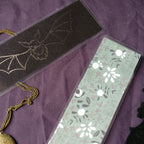 Focus on the Green Floral fabric backing.