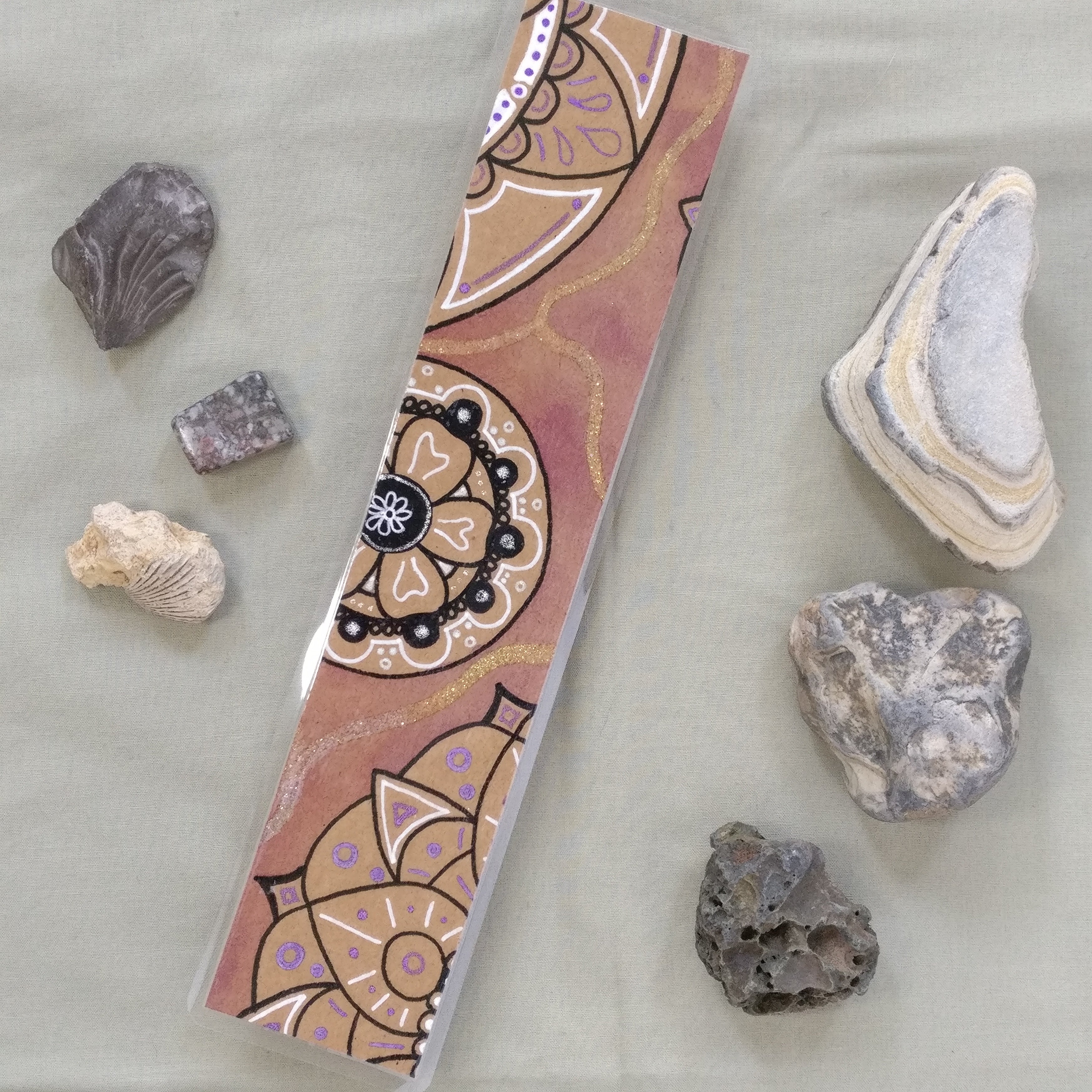 One of the purple Mandala bookmarks on its own in full view.