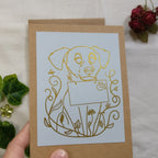The Dog Mail card with gold foil.