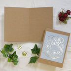 The front design and blank inside pages of the Dog Mail greeting card.