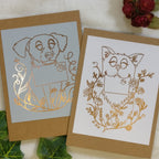 The two available "animal mail" designs: a dog on light grey and a cat on white, each illustration foiled by hand.