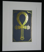Gold foiled Ankh symbol on a navy blue card mounted on white backing.